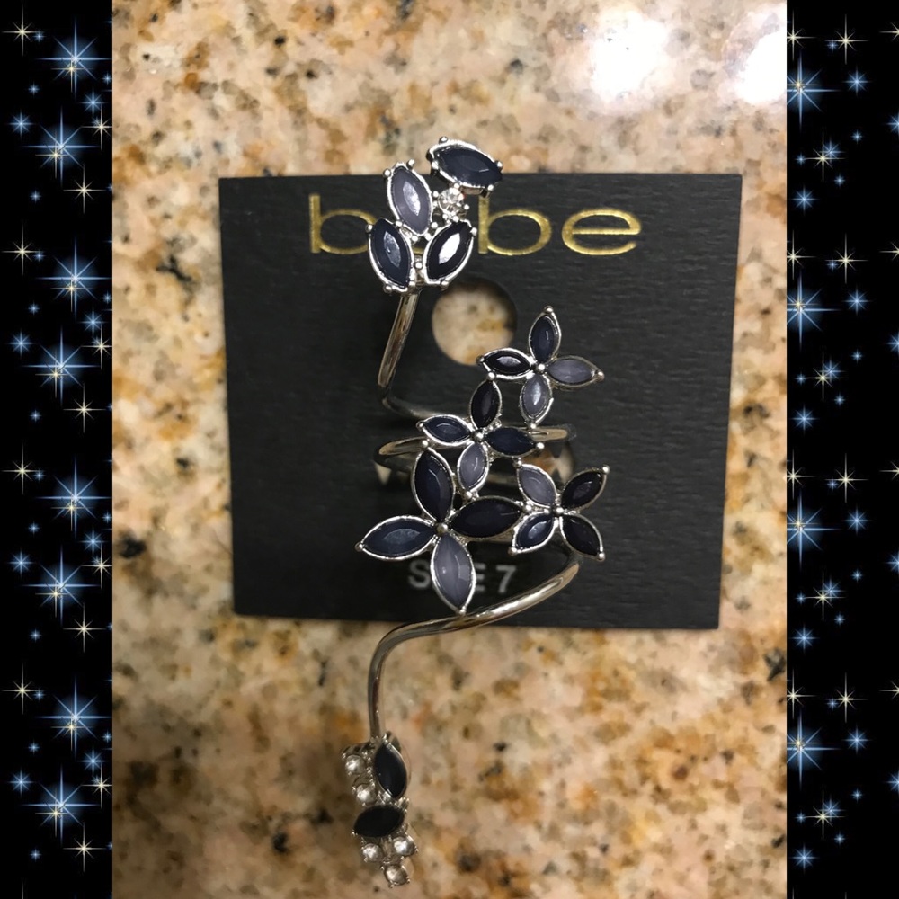 Bebe long knuckle ring, size 7, blue.